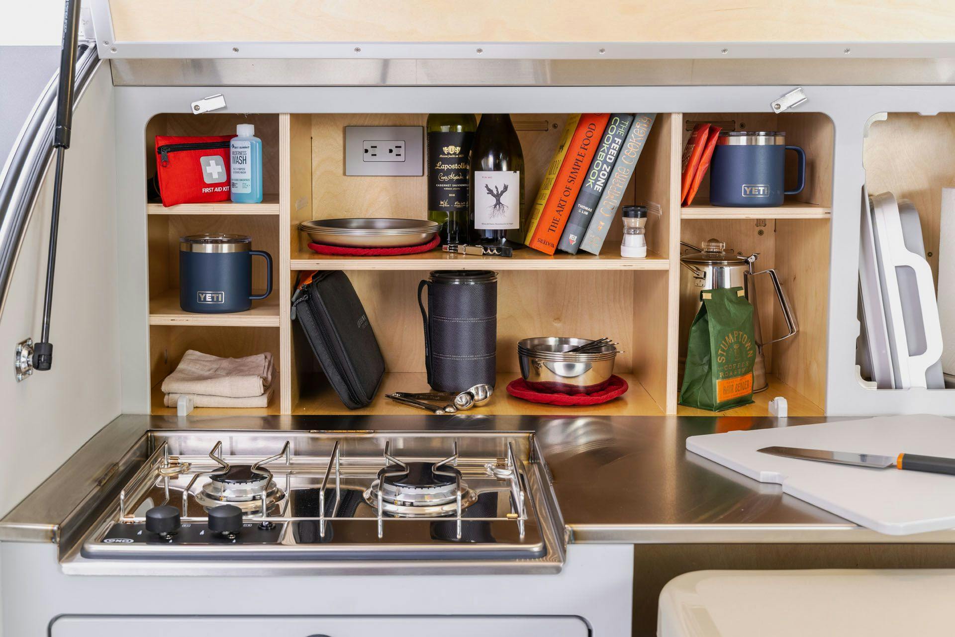 A beautiful camp kitchen in a teardrop camper.