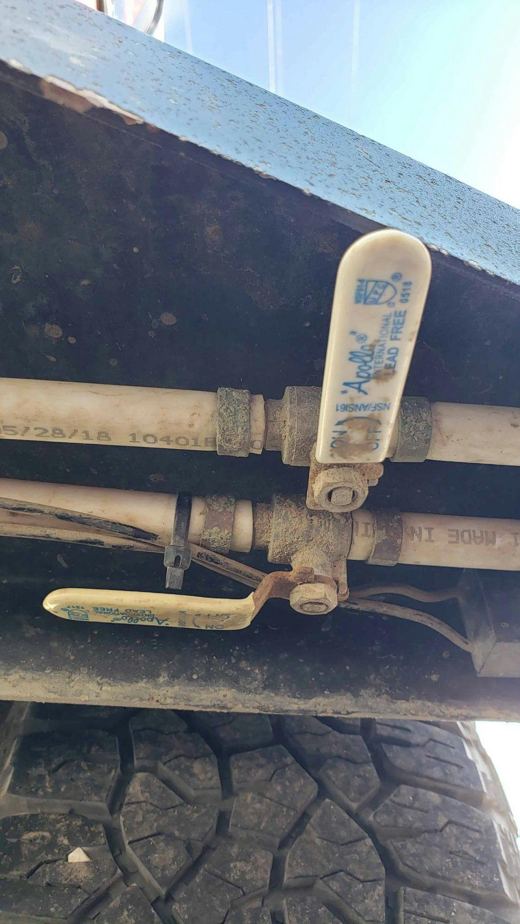 Water valves in an Original TOPO trailer, an adventure camper.