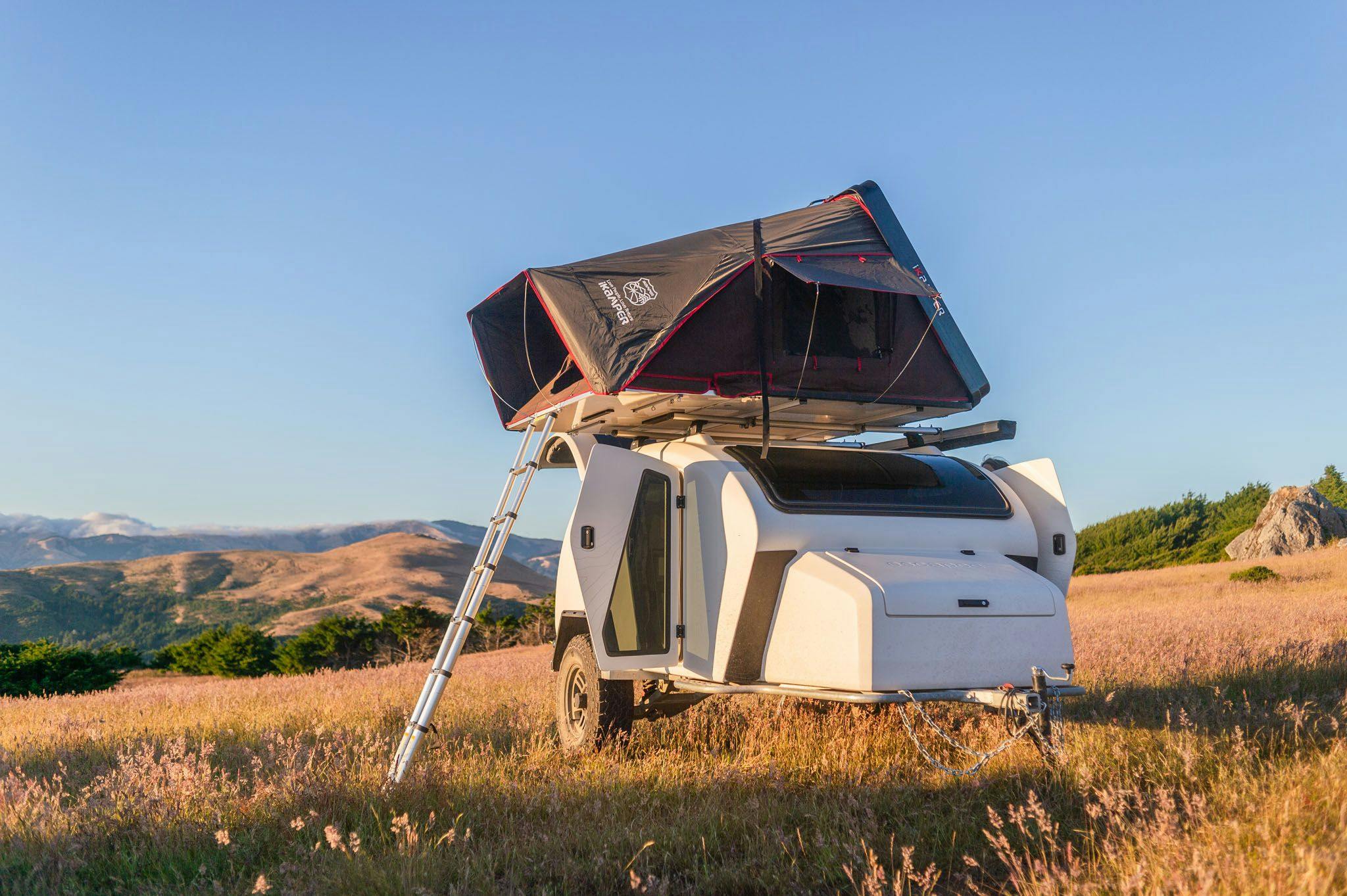 TOPO2 Voyager overlooking the beach with an iKamper mounted on top