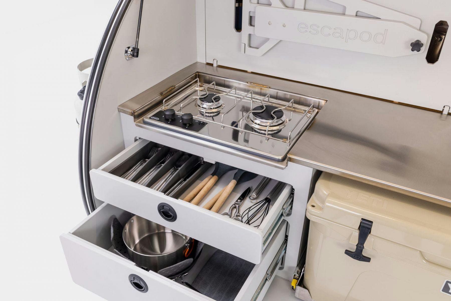 A beautiful camp kitchen in a teardrop camper.