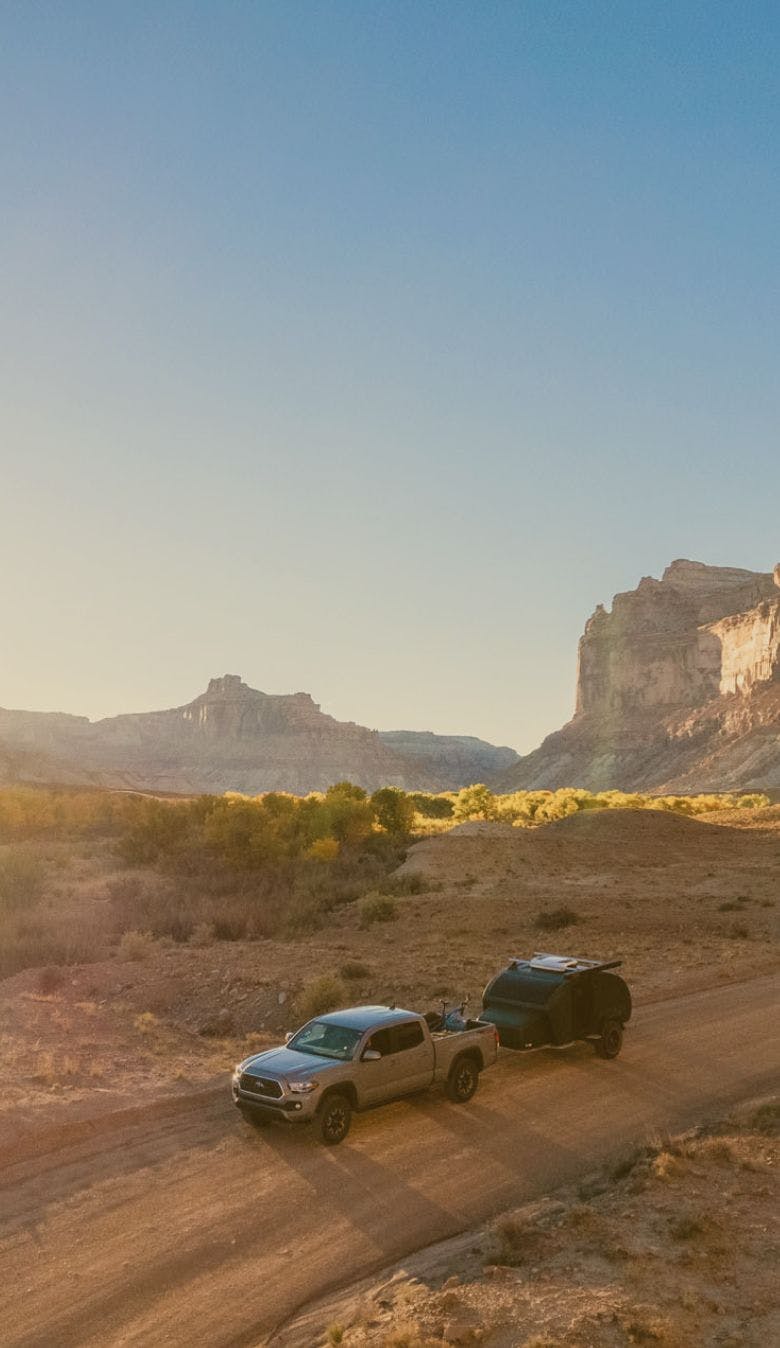 The TOPO2 Voyager being towed by a Toyota Tacoma in the San Rafael Swell.