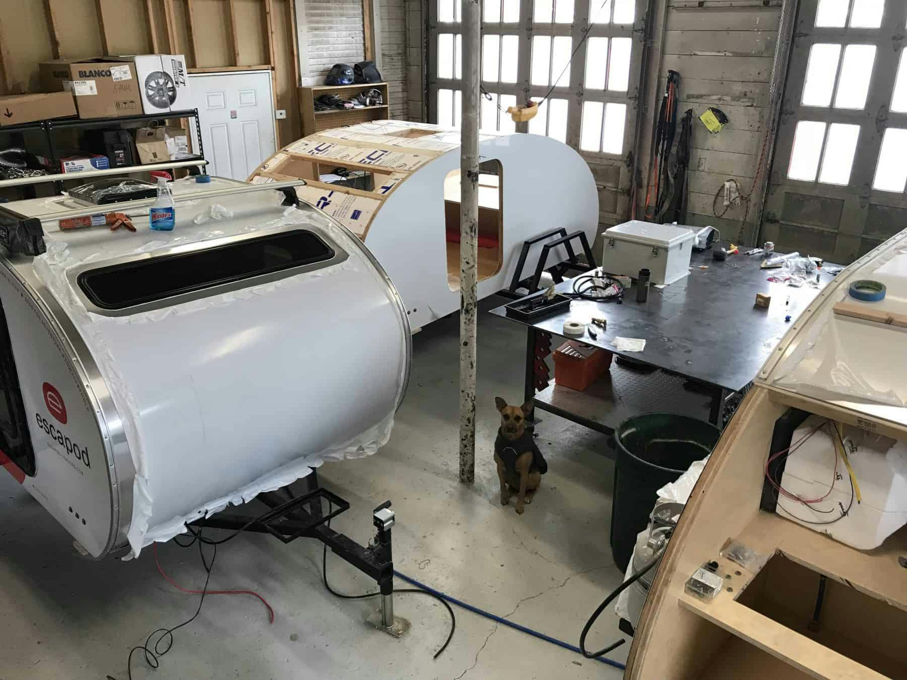 Teardrop camper being built in a small manufacturing facility.