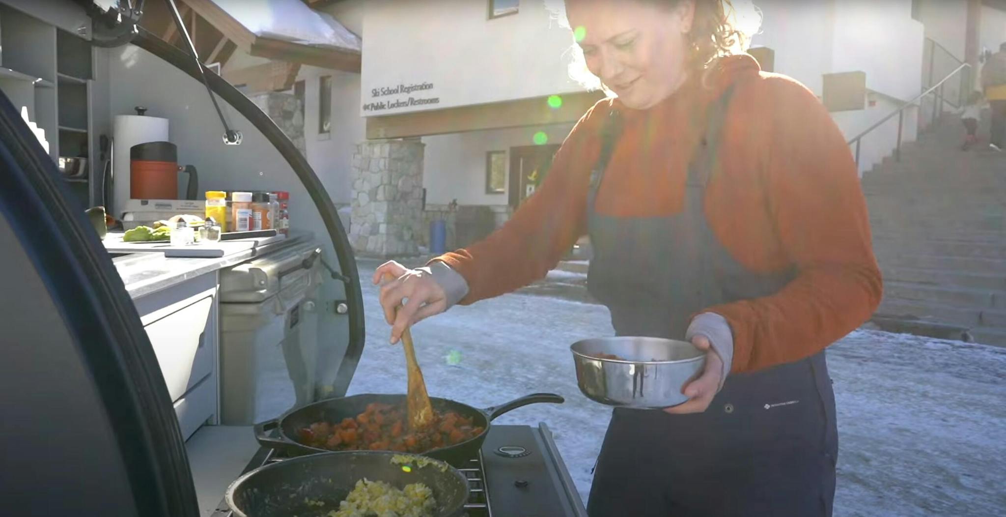 Cooking a camp meal at the base of Solitude, enjoying the perks of having a teardrop camper as a base camp.