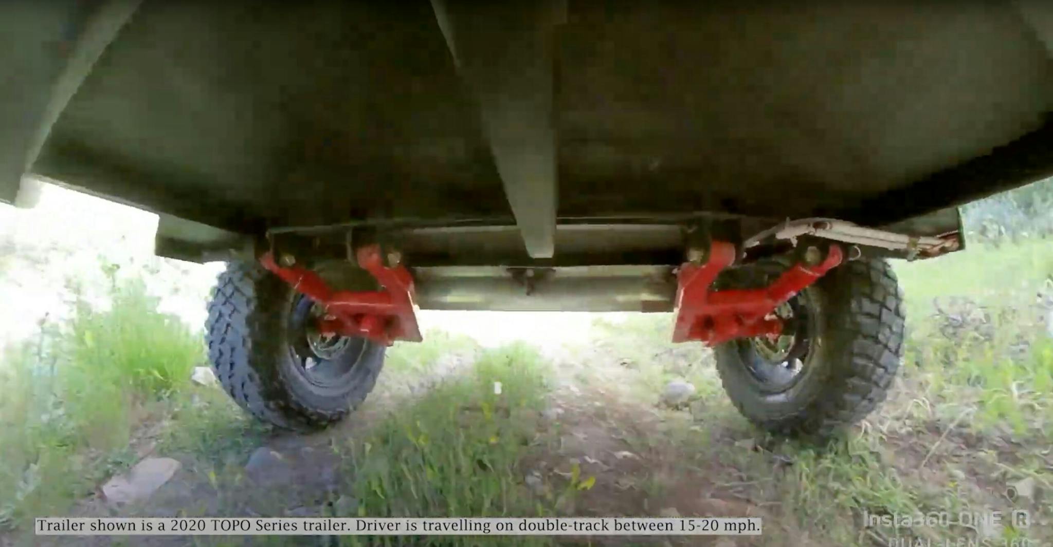 A view of Escapod's Freeride Suspension system on an Original TOPO teardrop trailer.