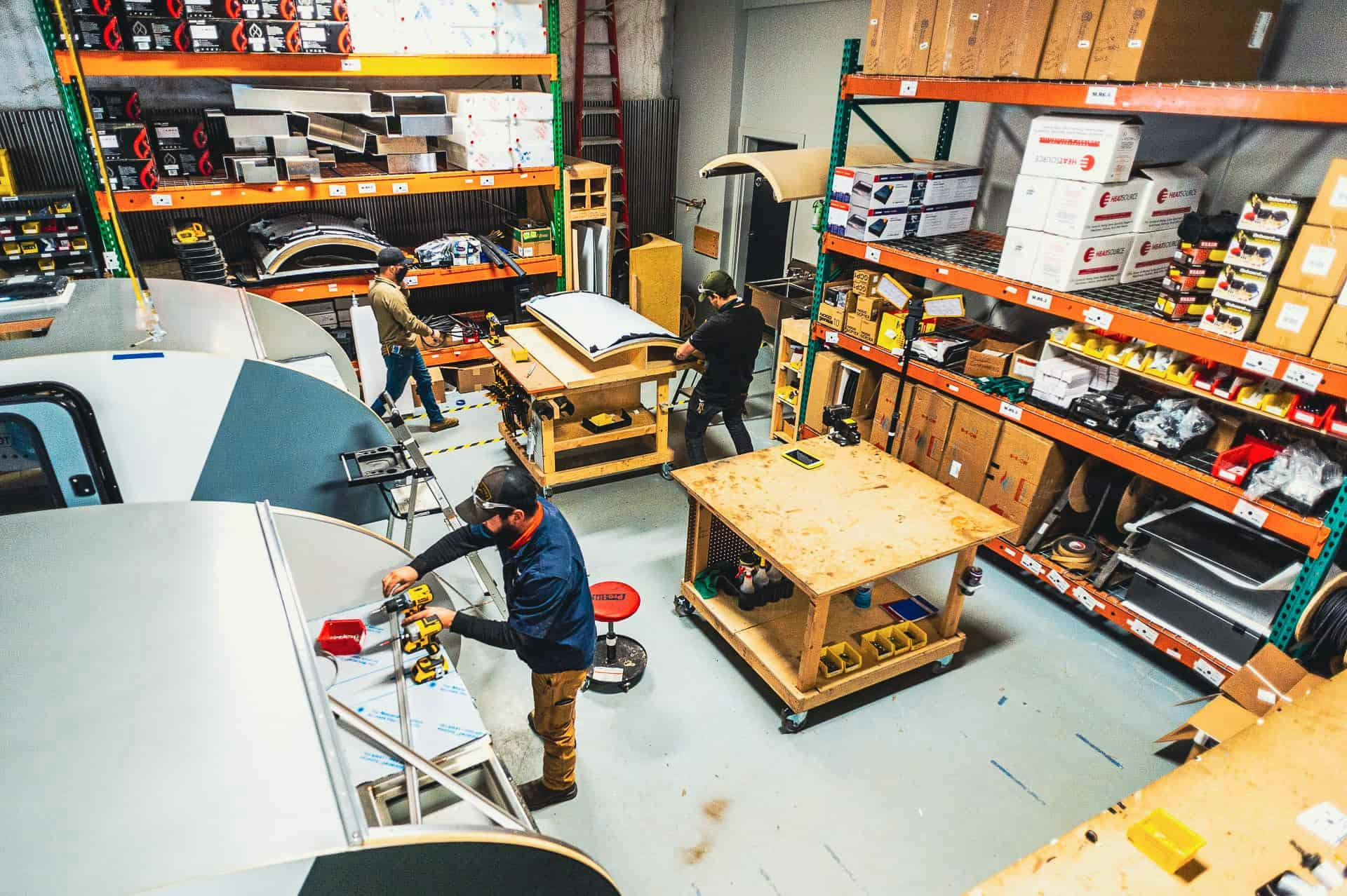 Teardrop campers being manufactured in a small business facility.